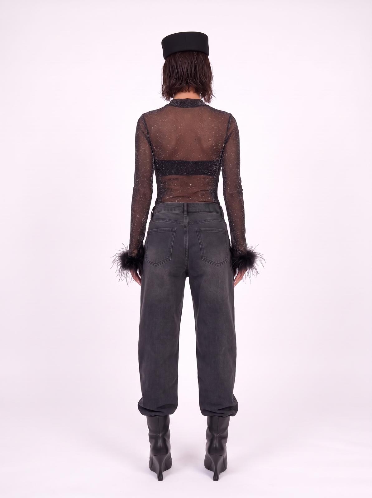 Jeans con bajo sin costura
